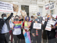 LGBT+ protestors highlight laws regarding gay conversion therapy during a demonstration outside The Cabinet Office, Whitehall, London, Great Britain 
23rd June 2021