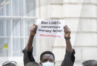 LGBT+ protestors highlight laws regarding gay conversion therapy during a demonstration outside The Cabinet Office, Whitehall, London, Great Britain 
23rd June 2021