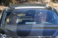 Britney Spears and her boyfriend Sam Asghari are spotted with her bodyguard driving around the local neighborhood after her conservatorship hearing earlier that day. 
