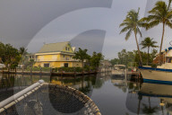 ‘The water is coming’: Florida Keys faces stark reality as seas rise. Officials prepare to elevate streets despite financial shortfalls, amid recognition that not every home can be saved.