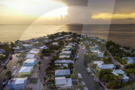 ‘The water is coming’: Florida Keys faces stark reality as seas rise. Officials prepare to elevate streets despite financial shortfalls, amid recognition that not every home can be saved.
