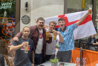 England fans start to arrive in London ahead of the Euro 2020 semi-finals