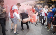 England fans roam around London's West End chanting and drinking before the Euros final match between England and Italy.