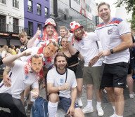 England fans roam around London's West End chanting and drinking before the Euros final match between England and Italy.