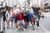 England fans roam around London's West End chanting and drinking before the Euros final match between England and Italy.