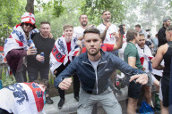 England fans roam around London's West End chanting and drinking before the Euros final match between England and Italy.