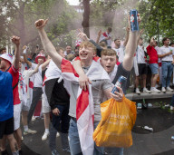 England fans roam around London's West End chanting and drinking before the Euros final match between England and Italy.