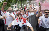England fans roam around London's West End chanting and drinking before the Euros final match between England and Italy.