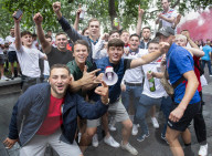 England fans roam around London's West End chanting and drinking before the Euros final match between England and Italy.