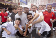 England fans roam around London's West End chanting and drinking before the Euros final match between England and Italy.