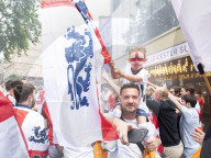 England fans roam around London's West End chanting and drinking before the Euros final match between England and Italy.