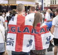 England fans roam around London's West End chanting and drinking before the Euros final match between England and Italy.