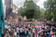 Fans celebrate ahead of England’s battle against Italy in the Euros final at Wembley. 