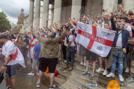 Fans celebrate ahead of England’s battle against Italy in the Euros final at Wembley. 