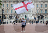 Fans celebrate ahead of England’s battle against Italy in the Euros final at Wembley. 