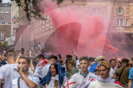 Fans celebrate ahead of England’s battle against Italy in the Euros final at Wembley. 