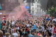 Fans celebrate ahead of England’s battle against Italy in the Euros final at Wembley. 