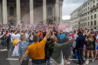 Fans celebrate ahead of England’s battle against Italy in the Euros final at Wembley. 