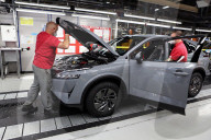 Workers on the production line at Nissan Sunderland in north east England. 