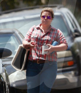 A stony faced Kelly Clarkson puts her divorce and custody drama aside as she heads to an afternoon meeting holding a coffee mug which carried the logo of her popular TV talk show. 