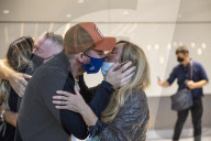 First arrivals at Heathrow airport from America to the UK since restrictions lifted.