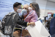 First arrivals at Heathrow airport from America to the UK since restrictions lifted.