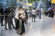 First arrivals at Heathrow airport from America to the UK since restrictions lifted.