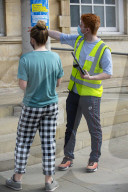 Members of the public queue outside a temporary Covid-19 vaccine centre at Battersea Arts Centre.