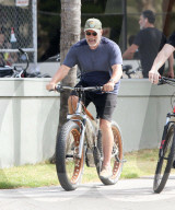 PREMIUM EXCLUSIVE Arnold Schwarzenegger Bikes Through Trash-Filled Streets En Route To The Gym