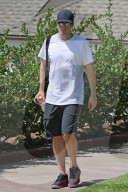 Robert Pattinson is seen leaving a friends house after playing tennis. 