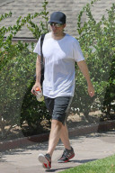 Robert Pattinson is seen leaving a friends house after playing tennis. 