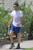Rami Malek, 40, is seen leaving a friends house after playing tennis.