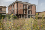 Buried in concrete: mafia architecture