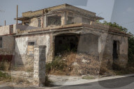 Buried in concrete: mafia architecture