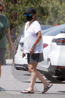 Lisa Marie Presley, 53, shows off her trim figure as she heads to a meeting in the San Fernando Valley.