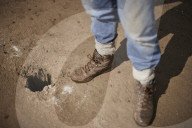 York City FC seeks relatives to find ashes buried under old pitch. Historic England project aims to find ashes of fans buried at football ground slated for redevelopment