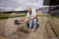 York City FC seeks relatives to find ashes buried under old pitch. Historic England project aims to find ashes of fans buried at football ground slated for redevelopment