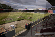 York City FC seeks relatives to find ashes buried under old pitch. Historic England project aims to find ashes of fans buried at football ground slated for redevelopment