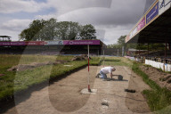 York City FC seeks relatives to find ashes buried under old pitch. Historic England project aims to find ashes of fans buried at football ground slated for redevelopment