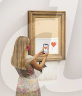 Banksy’s Love is in the bin at Sotheby’s, London. The painting famously shredded by Banksy after it last sold at Sotheby’s in 2018.