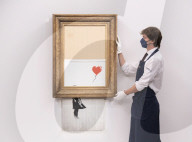 Banksy’s Love is in the bin at Sotheby’s, London. The painting famously shredded by Banksy after it last sold at Sotheby’s in 2018.