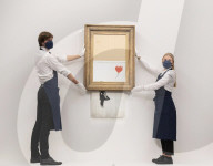 Banksy’s Love is in the bin at Sotheby’s, London. The painting famously shredded by Banksy after it last sold at Sotheby’s in 2018.