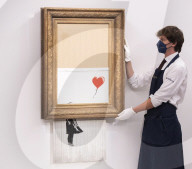 Banksy’s Love is in the bin at Sotheby’s, London. The painting famously shredded by Banksy after it last sold at Sotheby’s in 2018.
