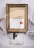 Banksy’s Love is in the bin at Sotheby’s, London. The painting famously shredded by Banksy after it last sold at Sotheby’s in 2018.