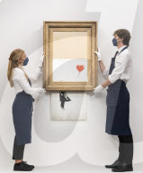 Banksy’s Love is in the bin at Sotheby’s, London. The painting famously shredded by Banksy after it last sold at Sotheby’s in 2018.