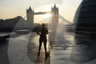 Sunrise today over the city of London and London Bridge 