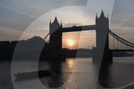 Sunrise today over the city of London and London Bridge 