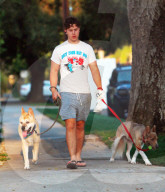 Rarely seen Modern Family child star Nolan Gould enjoys a relaxing evening dog walk in his LA neighborhood.  