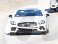 Britney Spears and Sam Asghari enjoy a Sunday evening car ride as they are pictured in public for the first time since announcing their engagement. 
