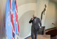 Prime Minister Boris Johnson addresses the press after attending a climate roundtable event